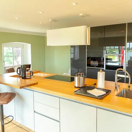 Gutshof-penthouse-wohnung- Seeblick Appartement Klein Upahl